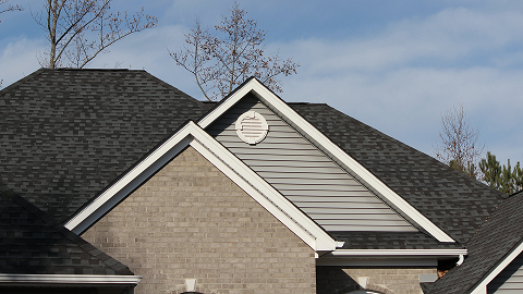 House with new charcoal color shingle roof